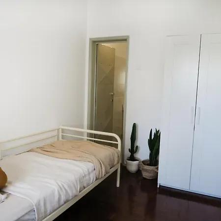 Cosmopolitan - Top Floor Δωμάτια σε οικογενειακή κατοικία *